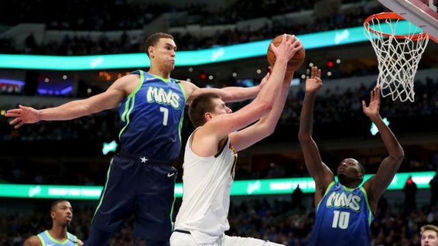 Nikola-Jokic-Beats-The-Game-Clock-With-An-Amazing-Shot-As-Nuggets-Beat-Mavs-107-106-On-The-Road