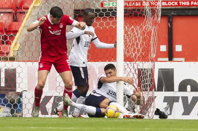 Leon Balogun is unhappy with the challenge from Aberdeen's Scott McKenna, which left him in a heap on his debut for Glasgow Rangers.