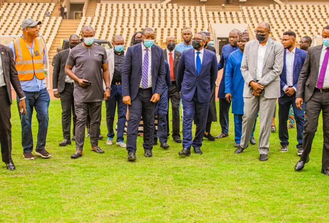 Dangote Visits Revamped Moshood Abiola Stadium Pitch, Lauds Sports Minister's Commitment To Sports Development